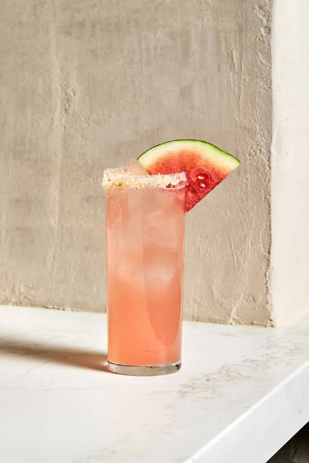 Waterpamelon, a pink paloma with a lime-salt rim and a watermelon wedge