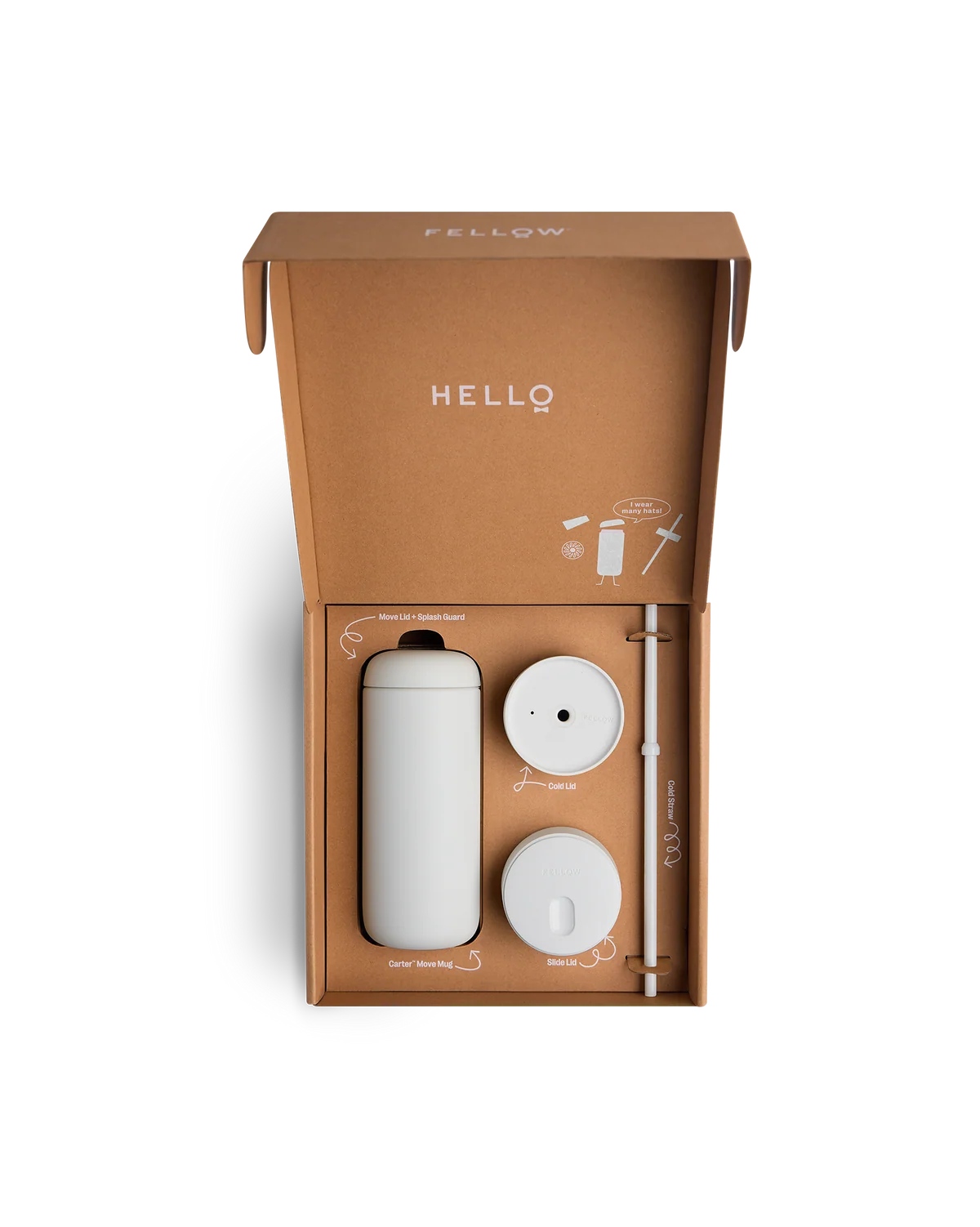 The Fellow Carter 3-in-1 gift box, open, holding the mug, two lids and a straw
